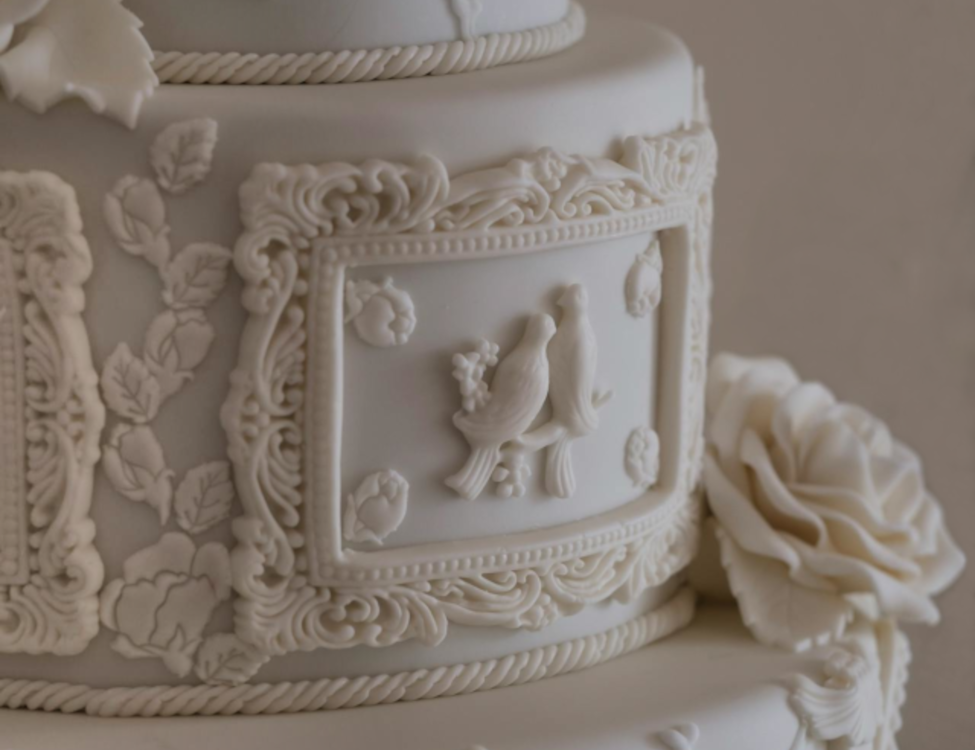 Picture of ornate wedding cake.